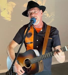 Dr. Jay playing the Essex Studios Art Walk